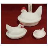 3 chickens on a nest