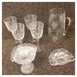 Clear glassware , pitcher, 4 wine glasses, candy