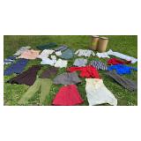 2 vats of vintage clothes taken out of an old