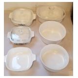 CorningWare dishes, some with lids
