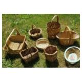 8 old baskets, 1 with tin bottom  in a bag