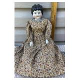 German china doll - hand is chipped/foot has