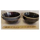 2 brown stoneware bowls