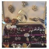 Small jewelry box full of earrings, & brooches