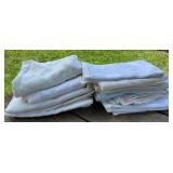 Stack of vintage tablecloths - nice material