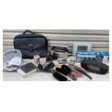 Clear tub of electronics & households - radios,