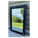 Early black framed mirror w/ super wavy glass