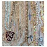 Group of necklaces - pheasant, elephants, Cross,