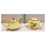 2 teapots, yellow and gold