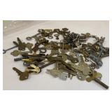 Clear pouch full of old keys