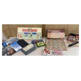 Box of games - Monopoly, Scrabble, Uno, Canasta,