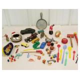 Assortment of toys , marbles, cars, noisy toy,