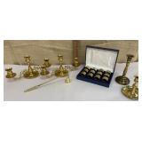 Brass candleholders, snuff & napkin rings