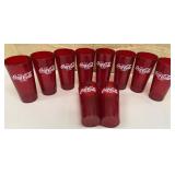 10 red plastic Coca-Cola tumblers