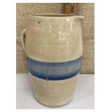 Stoneware pitcher w/ blue stripe - lip is chipped