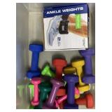 Clear tub of exercise weights