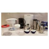 Nice lot of kitchen ware, cutting boards,