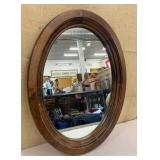 Wood framed oval mirror approx 19"x25"
