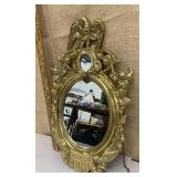 Heavy brass toned mirror w/ eagle