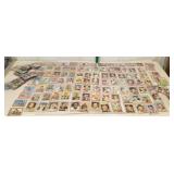 60 plus old foot ball, baseball cards in plastic