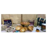 Green tub of misc. - wooden bowls, mirror tile,