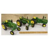 3 Ertl John Deere tractors
