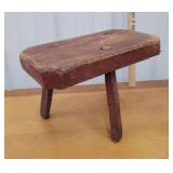 Old red 3 leg milk stool