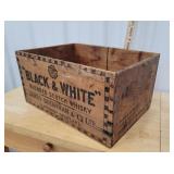 Black and white whisky crate
