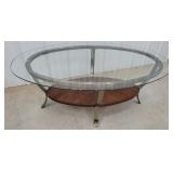 Oval glass top coffee table 48"28"20"