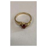 10k ring w/ red stone