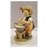 Hummel -  Girl washing baby