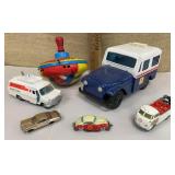 Diecast mail truck bank, toy cars, metal spin top