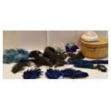 Vintage hats in a hat box, with feathers, etc