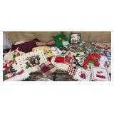 Box of Christmas linens - towels, placemats etc