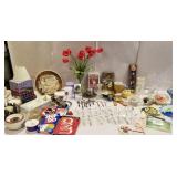 Misc glassware and silverware and candles, vases,