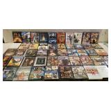50 DVDs, action movies, drama movies, etc