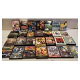28 DVDs, mostly double packs, action, comedy, etc