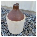 1 gallon brown and white jug