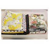 Plastic tub of quilting fabric