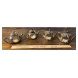 4 Godinger teapot napkin rings