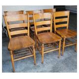 Set of 6 oak chairs -Notice the bottom book rack