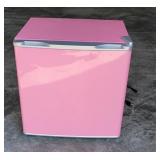 Apartment size mini pink fridge