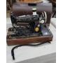 Singer sewing machine w/key & built-in oil can
