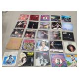 25 records- John mellencamp, Elvis, Bruce