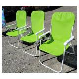 3 green folding chairs