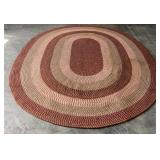 Oval braided rug 132"x101"