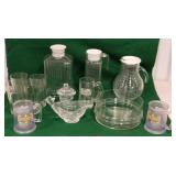 Clear glassware in tub, drinking glasses,