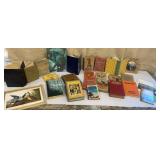 Box of old books & some art - a bit musty