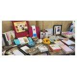 Clear tub of household - photo frames, smart