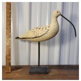 Large wooden shorebird with glass eyes